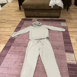 Large, light gray, Nike sweat suit